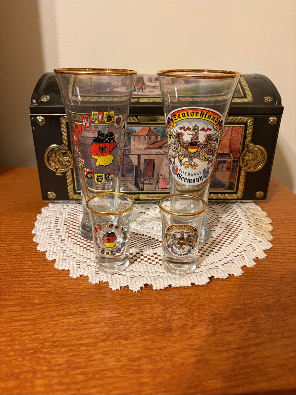 Vintage German Biscuit Tin with Pilser and Shot glasses.